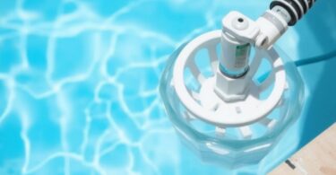 Detailed view of a pool skimmer and basket.
