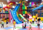 Children playing in a colorful indoor play center.