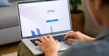 User accessing Estia Health eWise on a laptop.