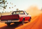 Aussie ute making U-turn, coins scattering.