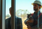 Boss watching tradie with a joey.