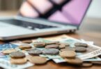 Aussie cash, coins, and a laptop.