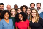 The House of Wellness cast smiling together.
