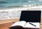 Australian landscape with laptop and notebook
