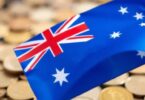 Australian flag with superimposed coins and tax document.