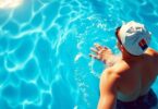 Fit Aussie swims laps in clear blue pool.