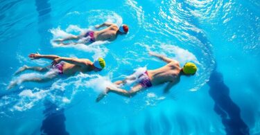 Swimmers in action at a modern Australian university pool.