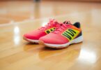 Indoor soccer shoes on polished wooden floor