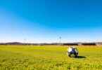 Aussie soccer action on a green field.