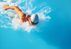 Swimmer executing advanced freestyle drill with powerful strokes