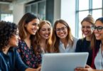 Australian women in tech collaborating in a bright office.