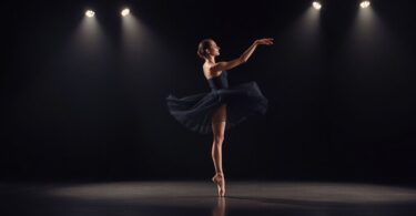 Ballet dancer in black tutu on stage.