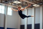 Gymnast in mid-air during a vault.