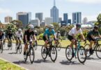 Cyclists riding on a scenic Melbourne road.