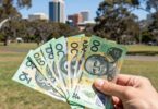 Money and Australian landmarks for side hustles.
