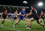Rugby league players in action during a match.