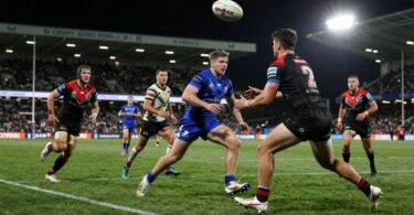 Rugby league players in action during a match.
