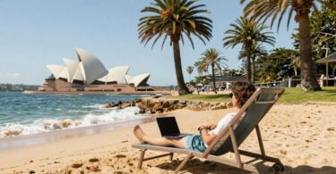Australian beach with person earning passive income.