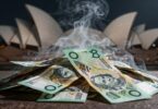 Australian dollars with smoke rising, Sydney Opera House blurred.