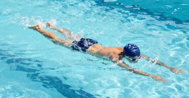 Beginner swimmer learning in Australian pool