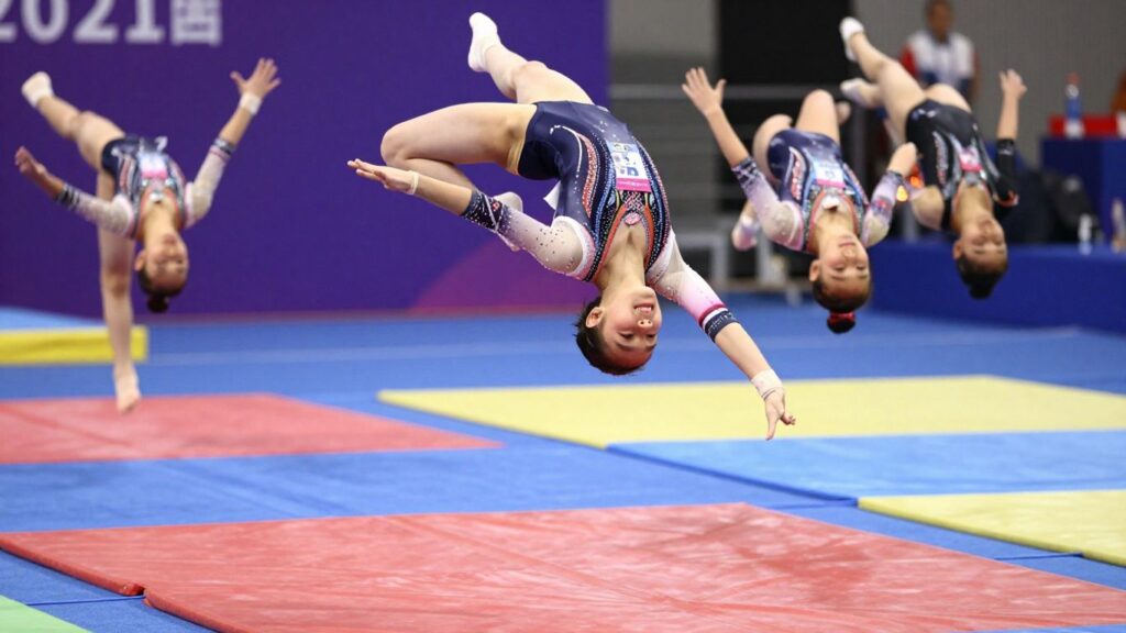 Young gymnasts performing flips and leaps in Craigieburn.
