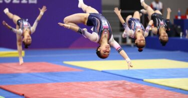 Young gymnasts performing flips and leaps in Craigieburn.