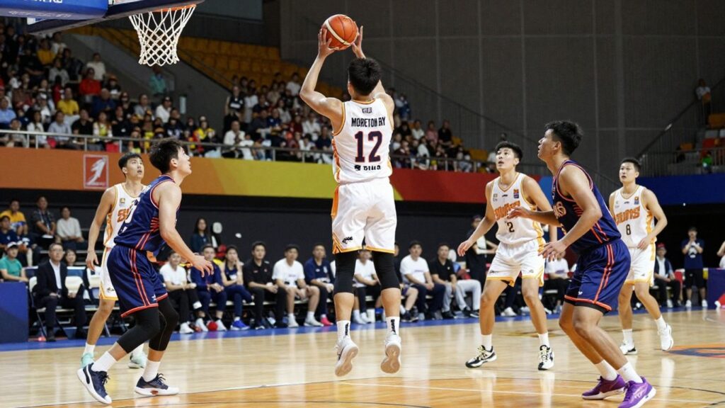 Moreton Bay Suns basketball players in action on court.