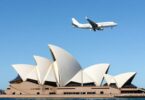 Sydney Opera House, Harbour Bridge, and airplane flying.