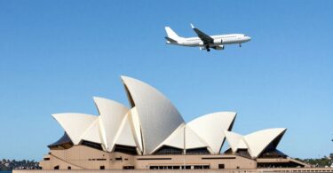 Sydney Opera House, Harbour Bridge, and airplane flying.