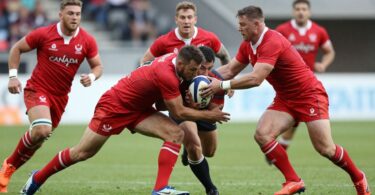 Canada Rugby League players in action on the field.