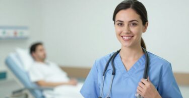 Nurse in scrubs, smiling, stethoscope, hospital background, career opportunity.
