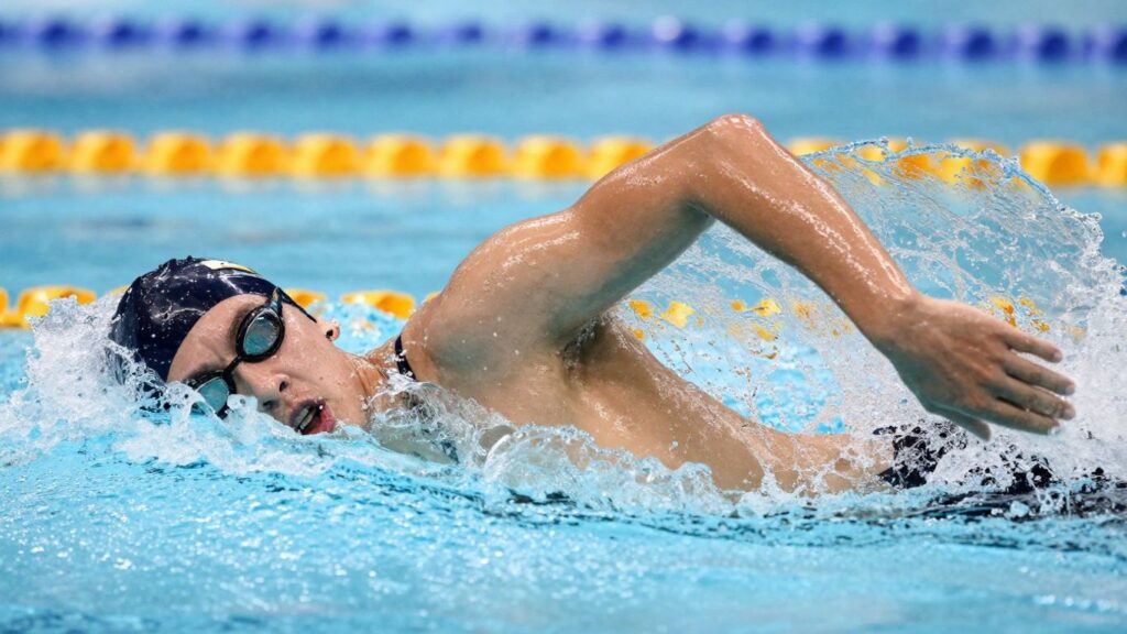 Swimmer's powerful underwater leg kick in action.