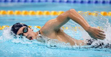Swimmer's powerful underwater leg kick in action.