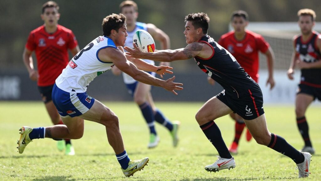 Oztag players in action on a sunny field.