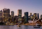 Australia's business skyline at dusk, harbour lights