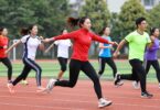 Active people in ONLY Sports Wear, dynamic outdoor sports scene.
