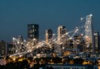 Modern cityscape with abstract network of lights.