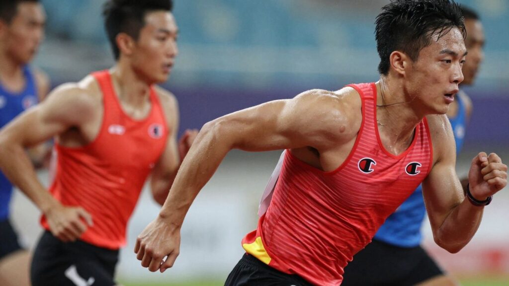 Athletes wearing Champion Sports Apparel in action.