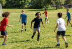 Children running and jumping at Little Athletics.