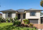 Australian home with sunny sky and green garden.